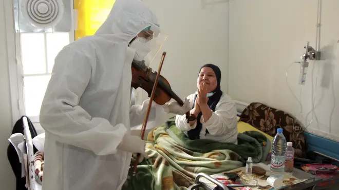 Dr Mohamed Salah Siala plays the violin for patients on the Covid wards of the Hedi Chaker hospital in Sfax, eastern Tunisia