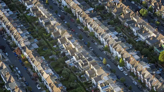 An aerial view of rows of houses