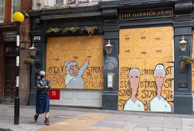 A pub is boarded up in Central London