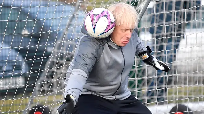 The Prime Minister pictured playing football in 2019
