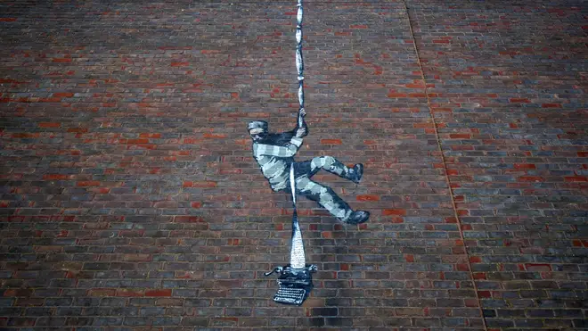 The Banksy artwork appeared on the side of the prison on Monday