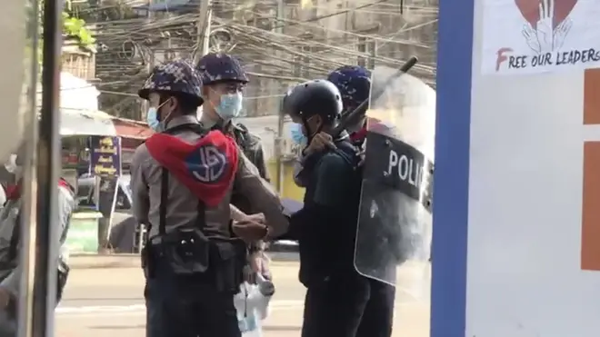 Associated Press journalist Thein Zaw is arrested by police in Yangon