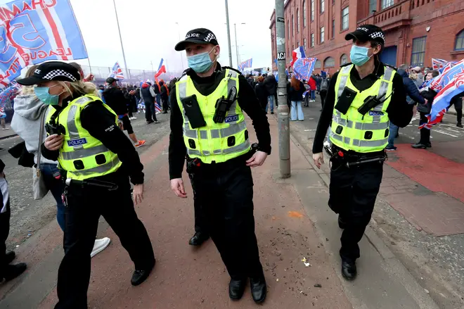 Police were present at Ibrox Stadium and George Square but appeared to be unable to stop fans gathering in breach of lockdown rules.