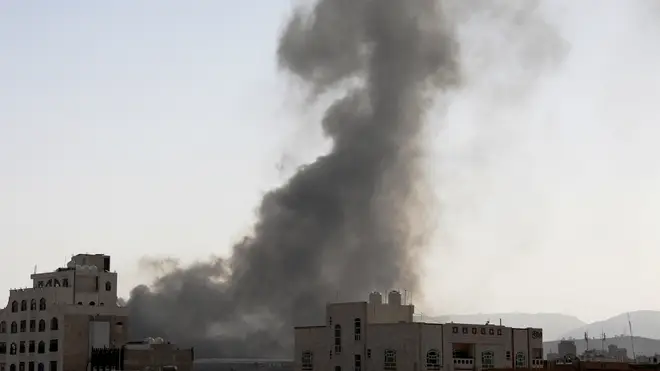 Smoke rises after Saudi-led air strikes on an army base in Sanaa, Yemen