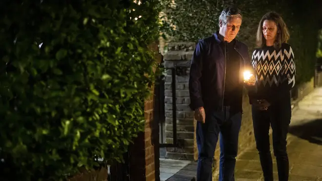Labour leader Sir Keir Starmer lit a candle outside his home with his wife