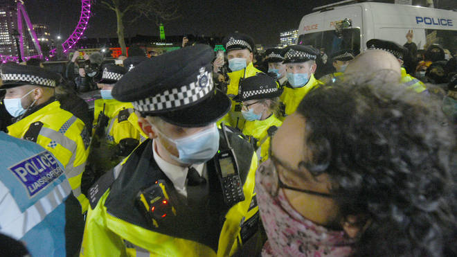 Police confronted protesters outside New Scotland Yard