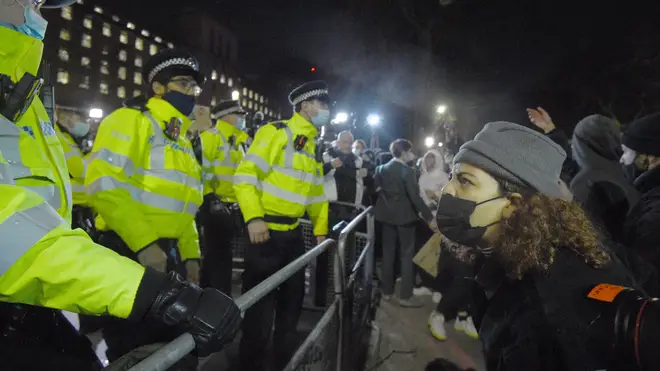 Police faced off with protesters outside New Scotland Yard