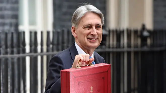 Philip Hammond holds up the Budget Red Box