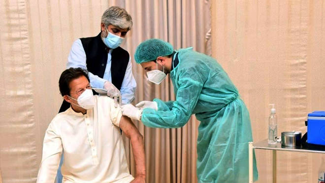 Pakistani Prime Minister Imran Khan receives a dose of COVID-19 vaccine in Islamabad