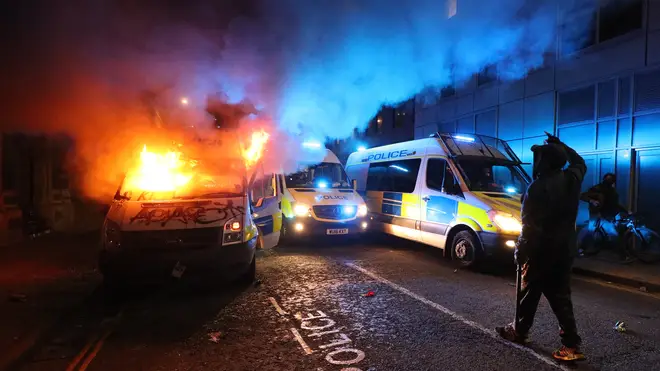 Police vans have been set on fire at the protests