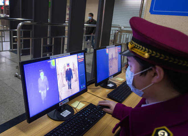 Chinese officials in Wuhan began locking down as the world braced itself