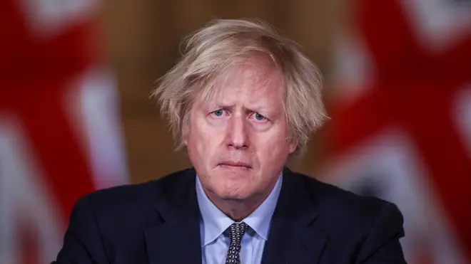 Boris Johnson hailed the UK's courage through a year of lockdowns