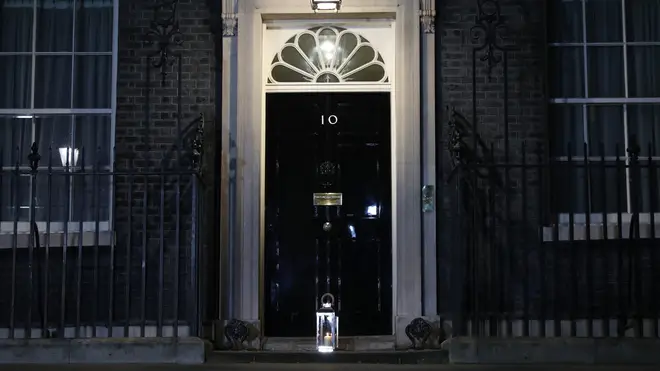A candle was placed outside 10 Downing Street to signify a "beacon of remembrance" in London