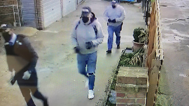 CCTV of three men who posed as police officers and stole £20,000 during a "violent burglary" in south London has been released