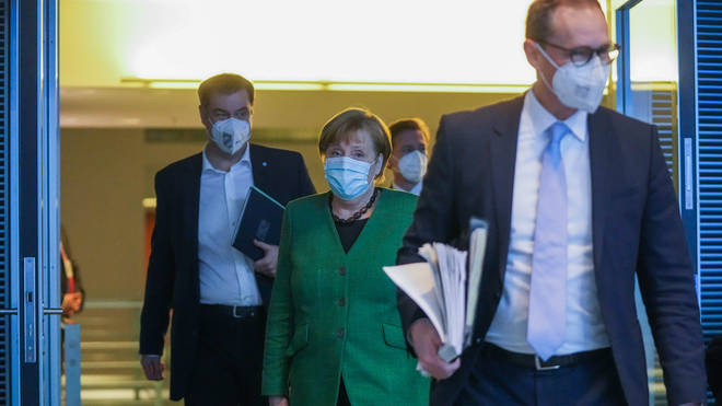 Angela Merkel warned of a "new pandemic" at a press conference on Tuesday