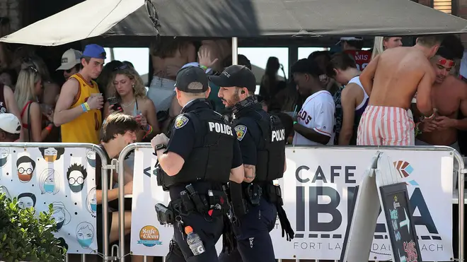 Authorities have struggled to manage huge gatherings of people at bars and beaches during the US spring break