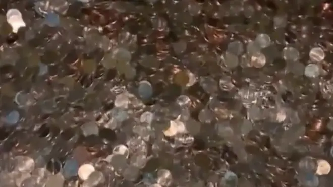 The pennies were left at the bottom of the man's driveway