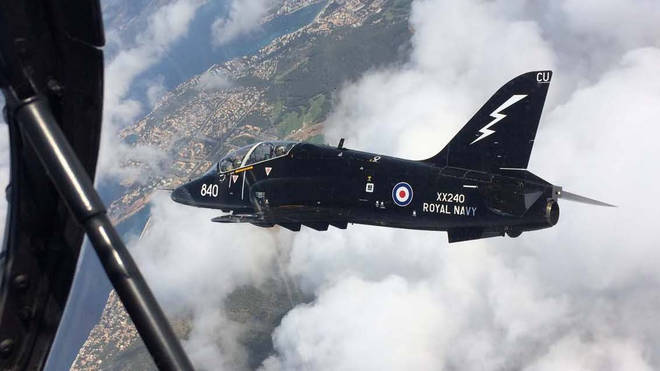 Two Royal Navy pilots ejected moments before their Hawk T1 jet crashed