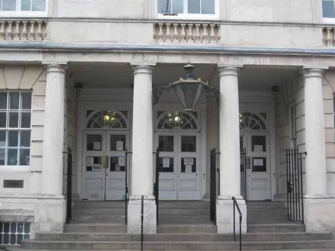 Verphy Kudi stood in the dock at Lewes Crown Court on Friday morning