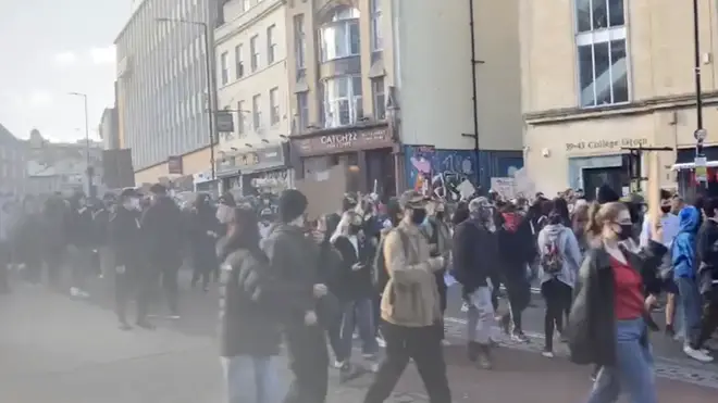 Protesters marched through the centre of Bristol from College Green