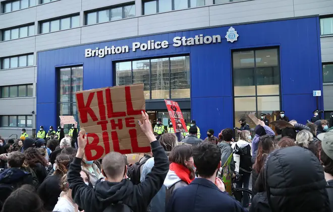 Demonstrators outside Brighton Police Station during a Kill The Bill protest