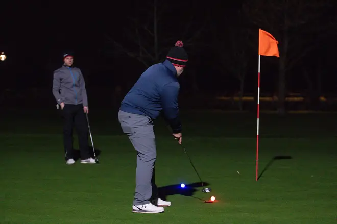The golfers used glow-in-the-dark balls and floodlit greens