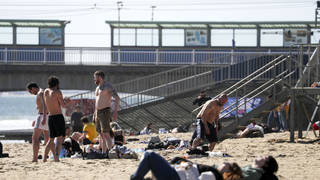 Sun-seekers gather on Bournemouth beach as lockdown eased today.