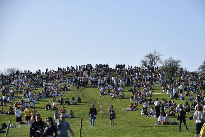 Hundreds gathered at Primrose Hill as a mini heatwave swept the UK