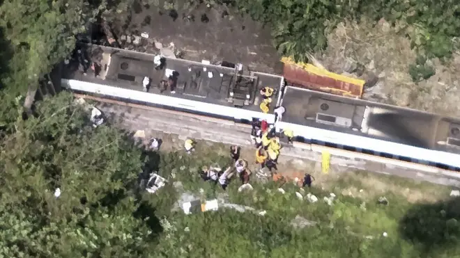 Firefighters are working to free any of the trapped passengers