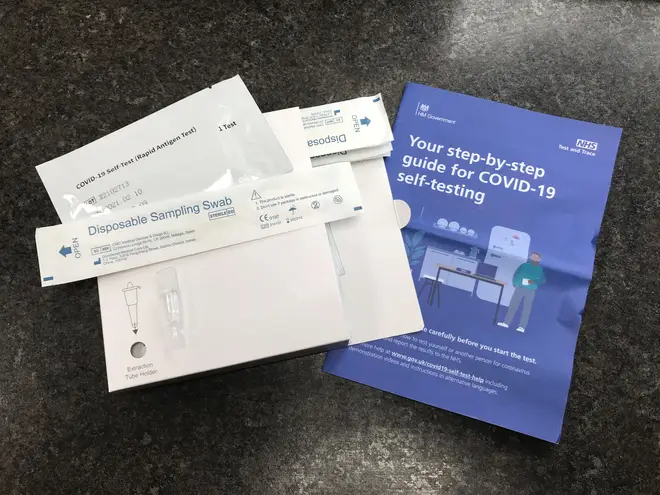 A package of seven NHS Test and Trace Covid-19 self-testing kits, similar to that which will be handed out by pharmacies.