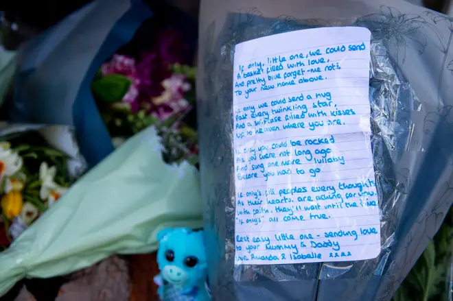 Some left emotional messages alongside flowers.