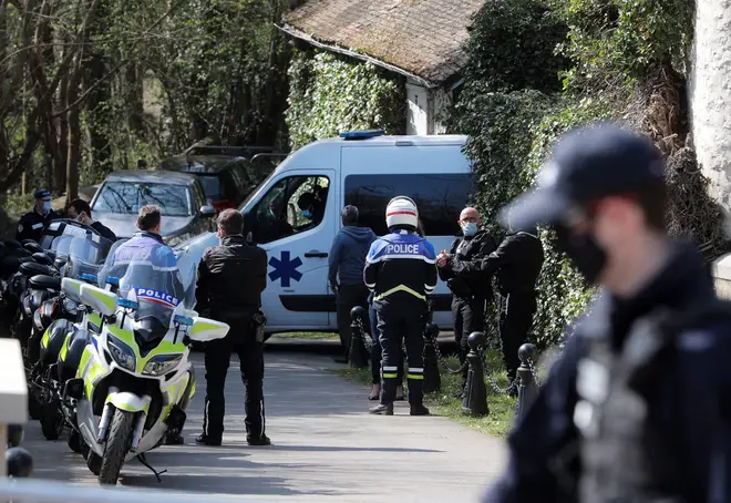 Police stand guard at Bernard Tapie's house in Combs la Ville.