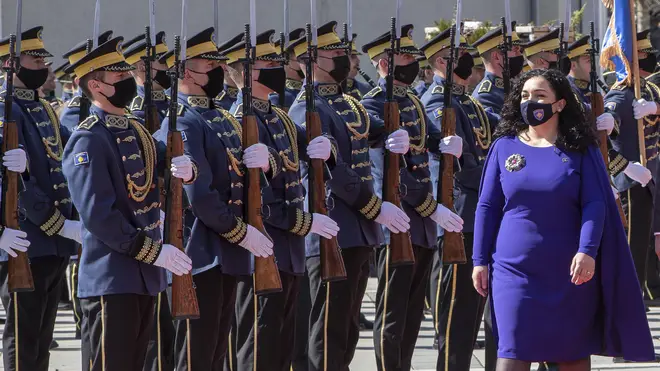 Kosovo's newly elected president Vjosa Osmani-Sadriu, inspects the Guard of Honour (Visar Kryeziu/AP)