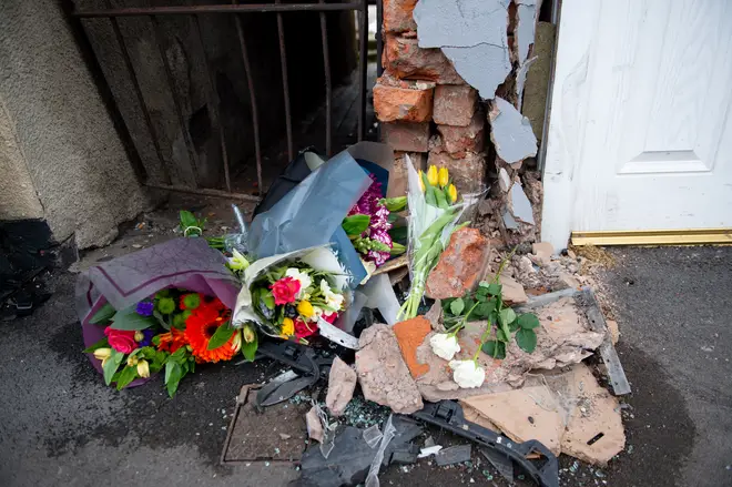 Flowers were initially left amongst the debris from the crash, before more were place to cover it.