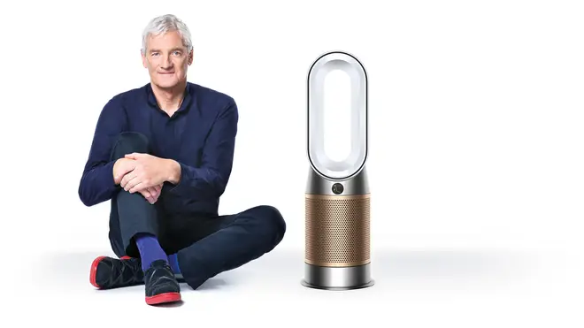 James Dyson with the firm's latest air purifier, which is able to remove the pollutant formaldehyde from the air