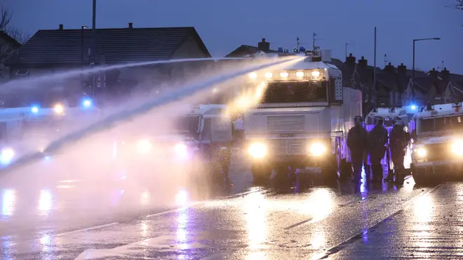 Police responded to the rioters by firing a water cannon at them