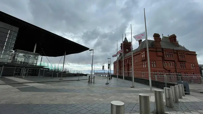 Flags were lowered at half-mast outside the Senedd in Cardiff, Wales