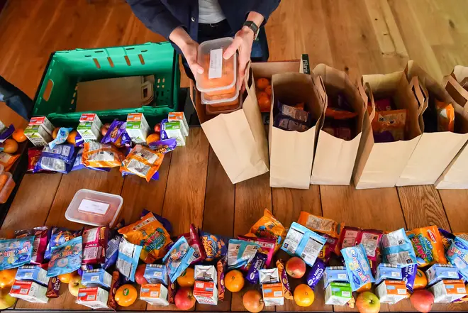 A scheme to help families with food and bills has been extended