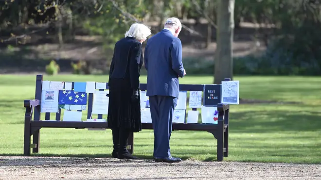 Charles and Camilla read messages left for the Duke of Edinburgh