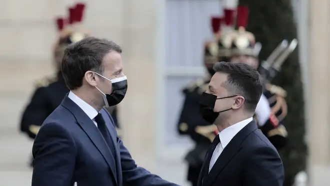 French President Emmanuel Macron, left, welcomes Ukrainian President Volodymyr Zelenskyy at the Elysee palace (Lewis Joly/Associated Press)