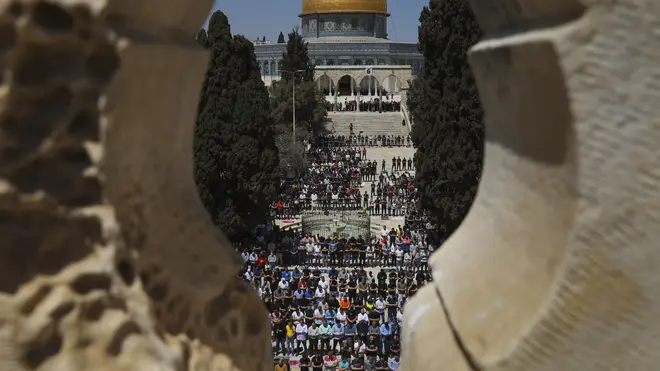 Palestinian worshipers pray during the first Friday of the holy month of Ramadan at the al Aqsa Mosque compound in Jerusalem’s old city (Mahmoud Illean/AP)