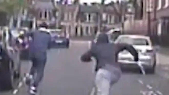 Footage shows the defendants being chased by officers