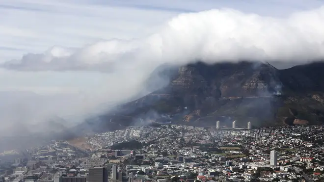 Clouds of smoke are seen above the city of Cape Town, South Africa