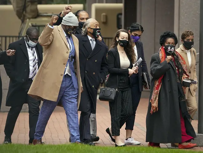 Rev Al Sharpton and Philonise Floyd (second from left), brother of George Floyd, arrive along with Congresswoman Sheila Jackson (second from right) at Hennepin County Government Center