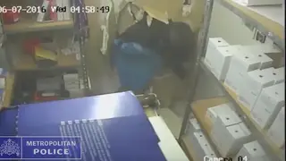 Moped gang smash through wall in phone shop raid