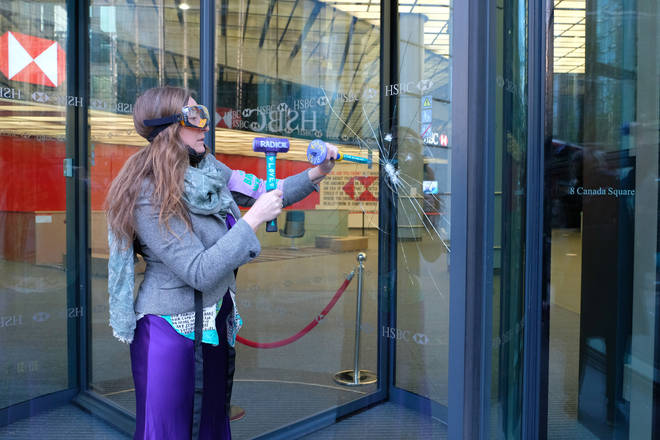 Extinction Rebellion activists used hammers and chisels to "carefully" break the glass.