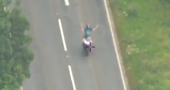 Police helicopter footage showed Alex Sartain waving to them as he rode along at high speed.