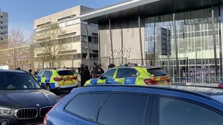 A man has been detained following reports of shots being fired near Crawley College in West Sussex, police have confirmed