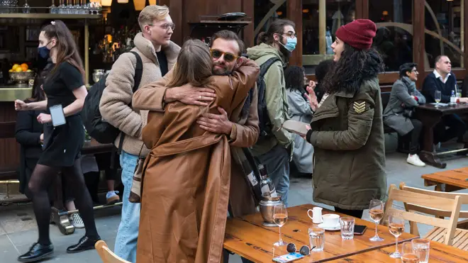 Hugging friends and family is set to be allowed in two weeks
