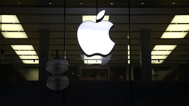 An illuminated Apple logo